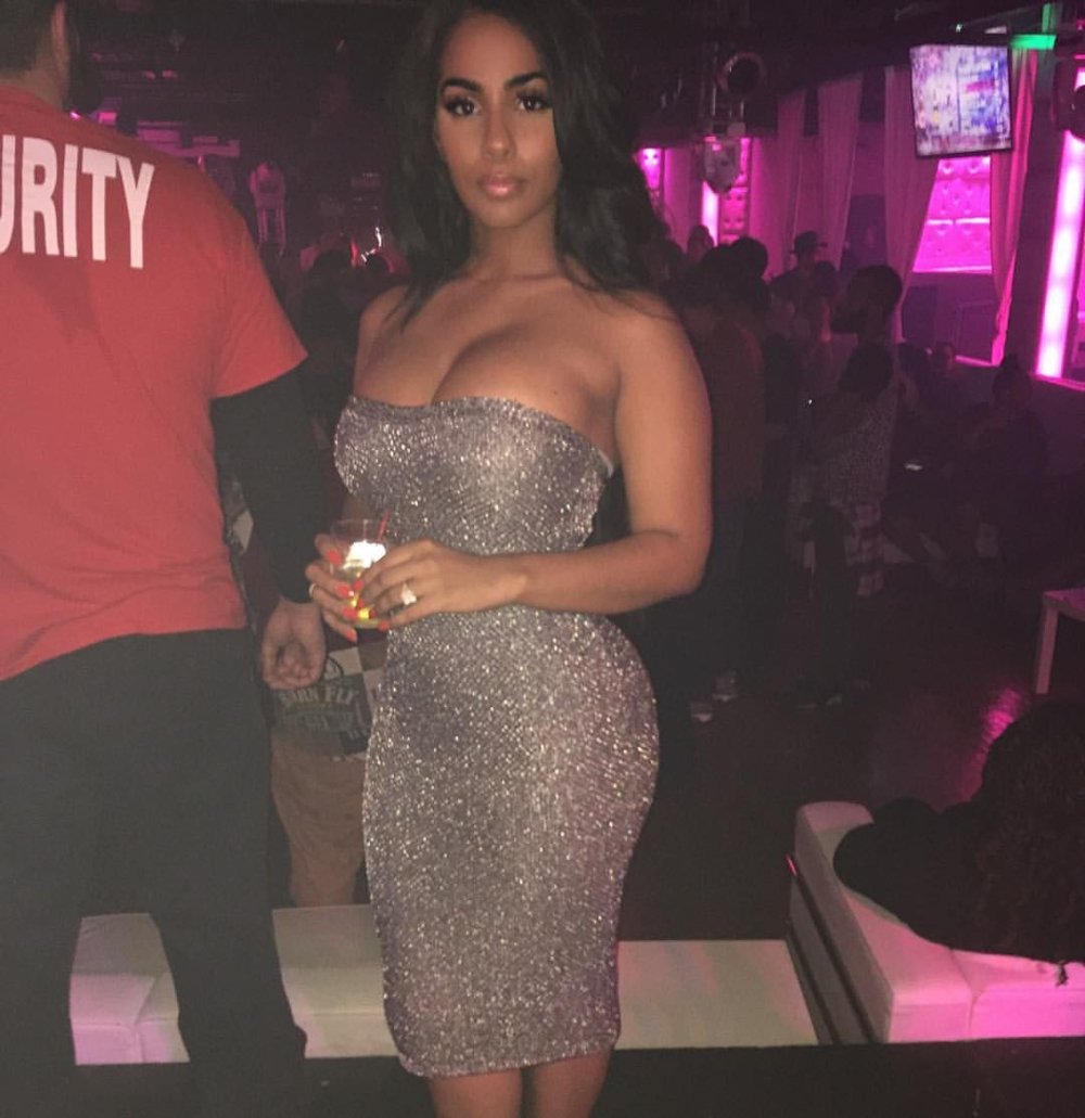 Aisha Diaz in a dress