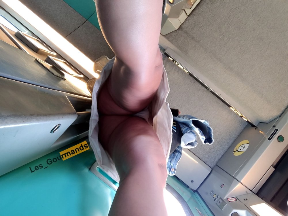 Under a skirt without panties on the bus