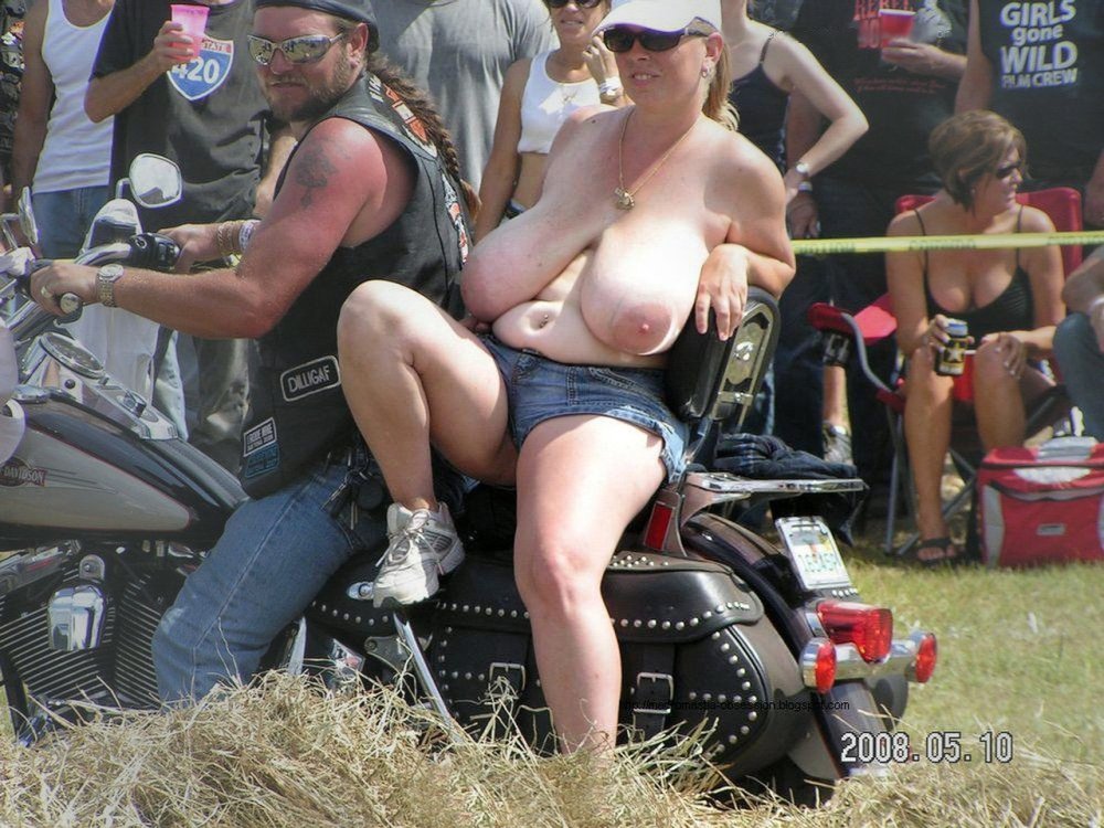 Naked fatties on a motorcycle