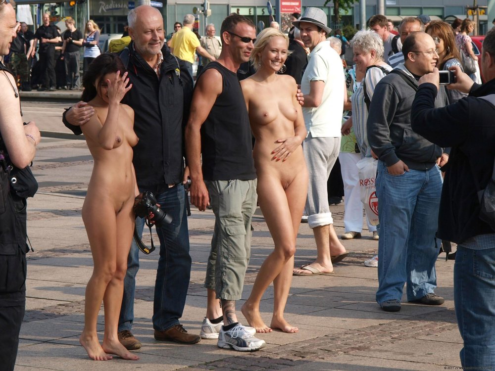 The girl undresses in front of her husband