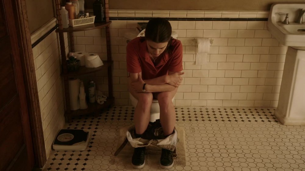 Lucy Griffiths on the toilet