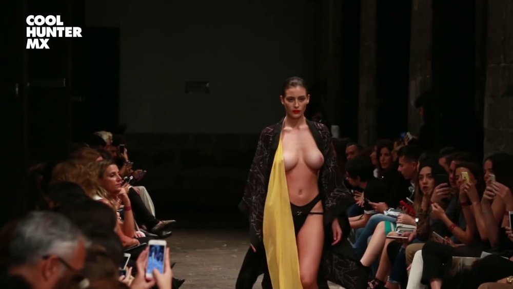 Fashion show with bare breasts