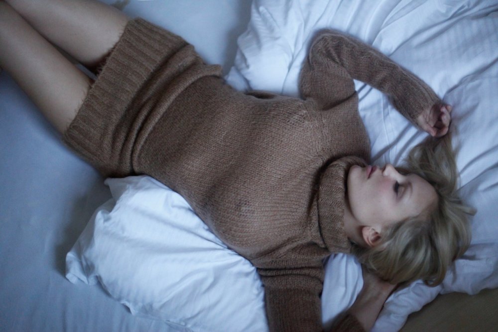 Sweaters with a naked throat