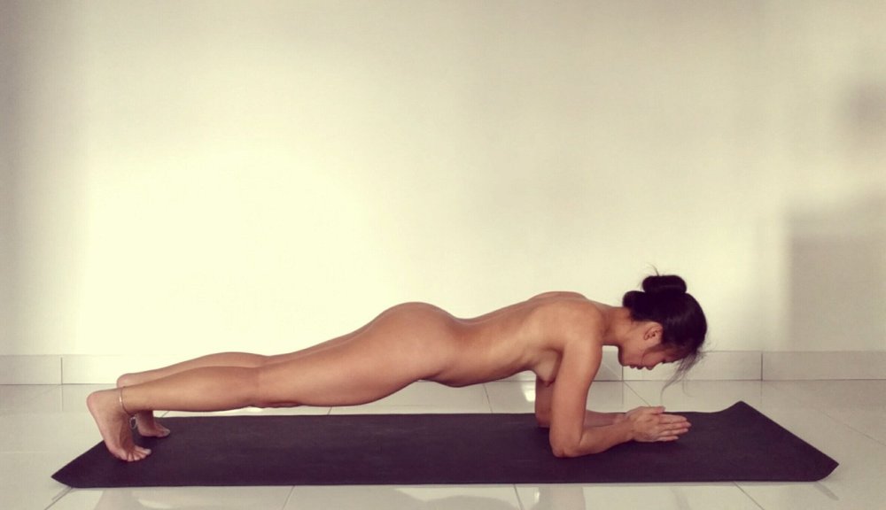 Naked yoga on the platform