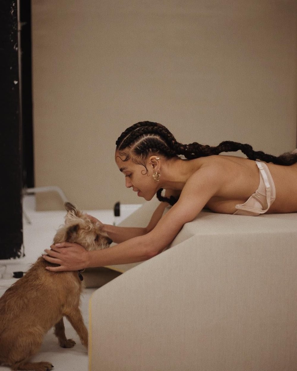 The woman tied her copy to the dog