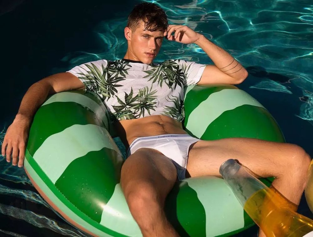 Jacob Dooley in swimming trunks