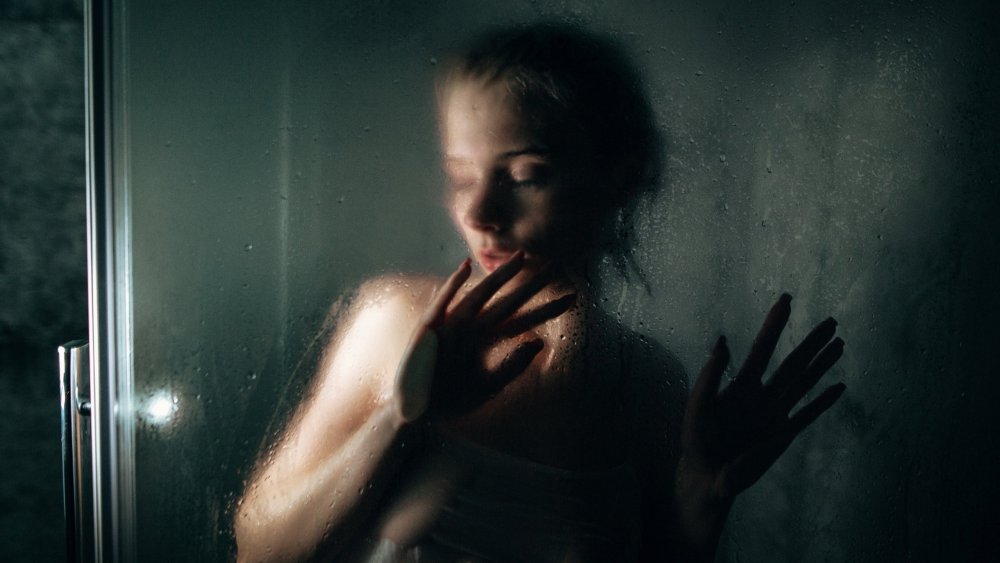 In the shower in clothes