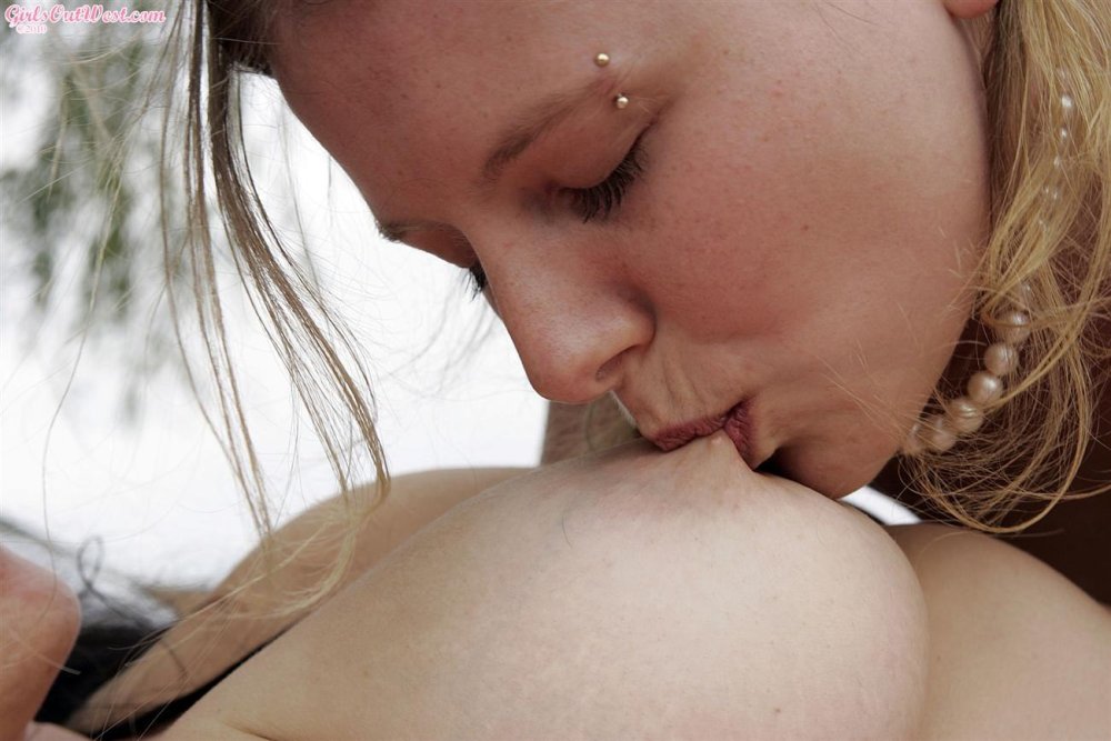 Girl licks her chest for a girl