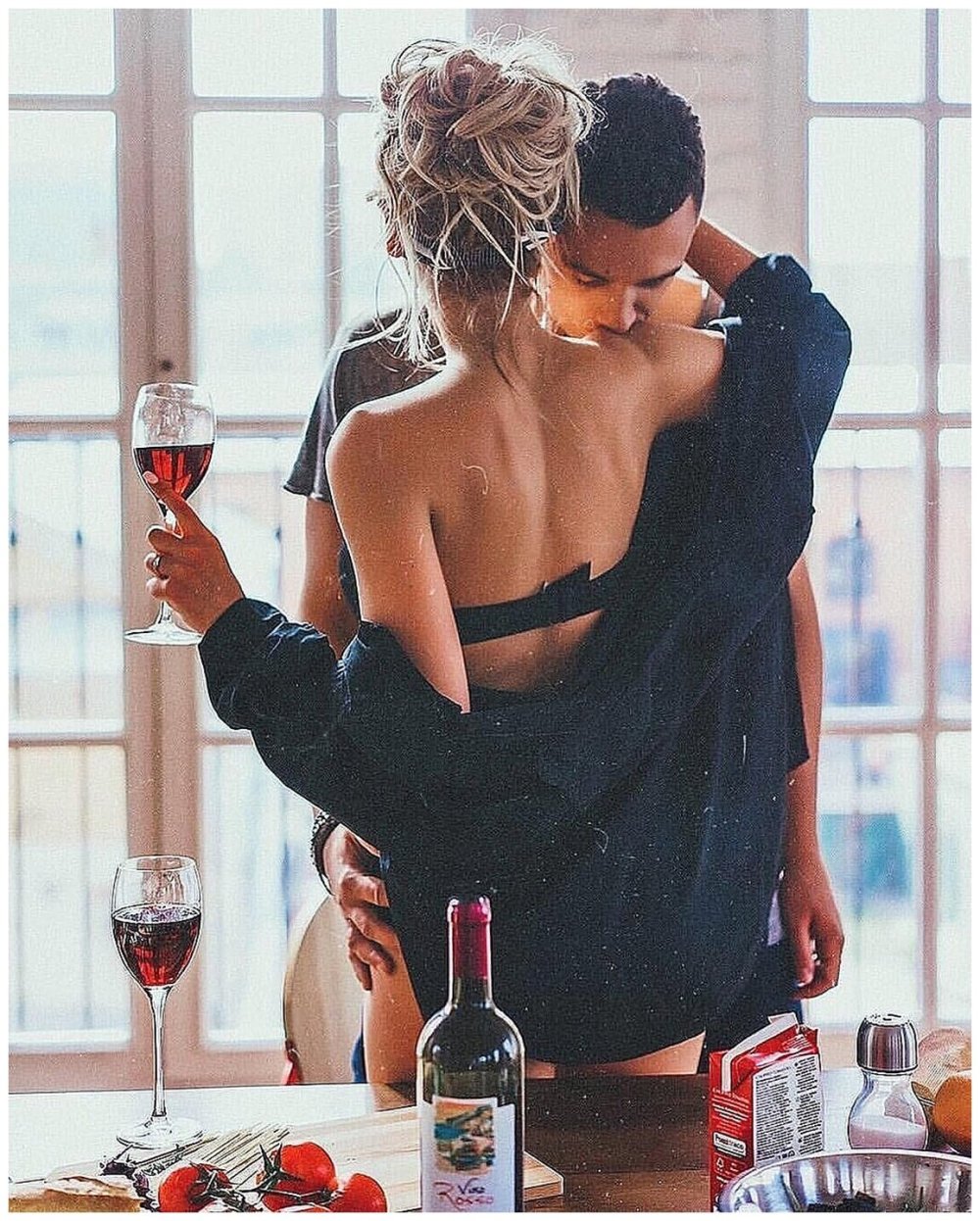 Girl and guy with wine