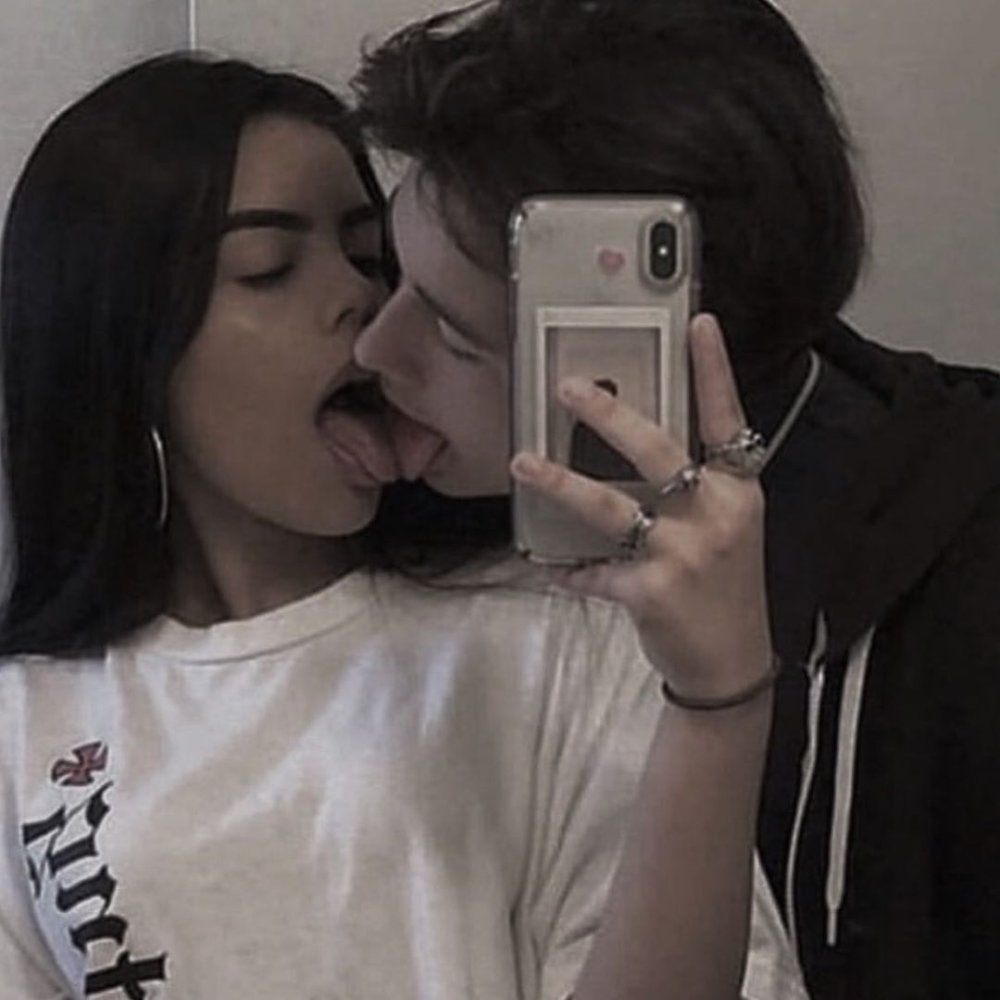 Peyton and his girl kiss