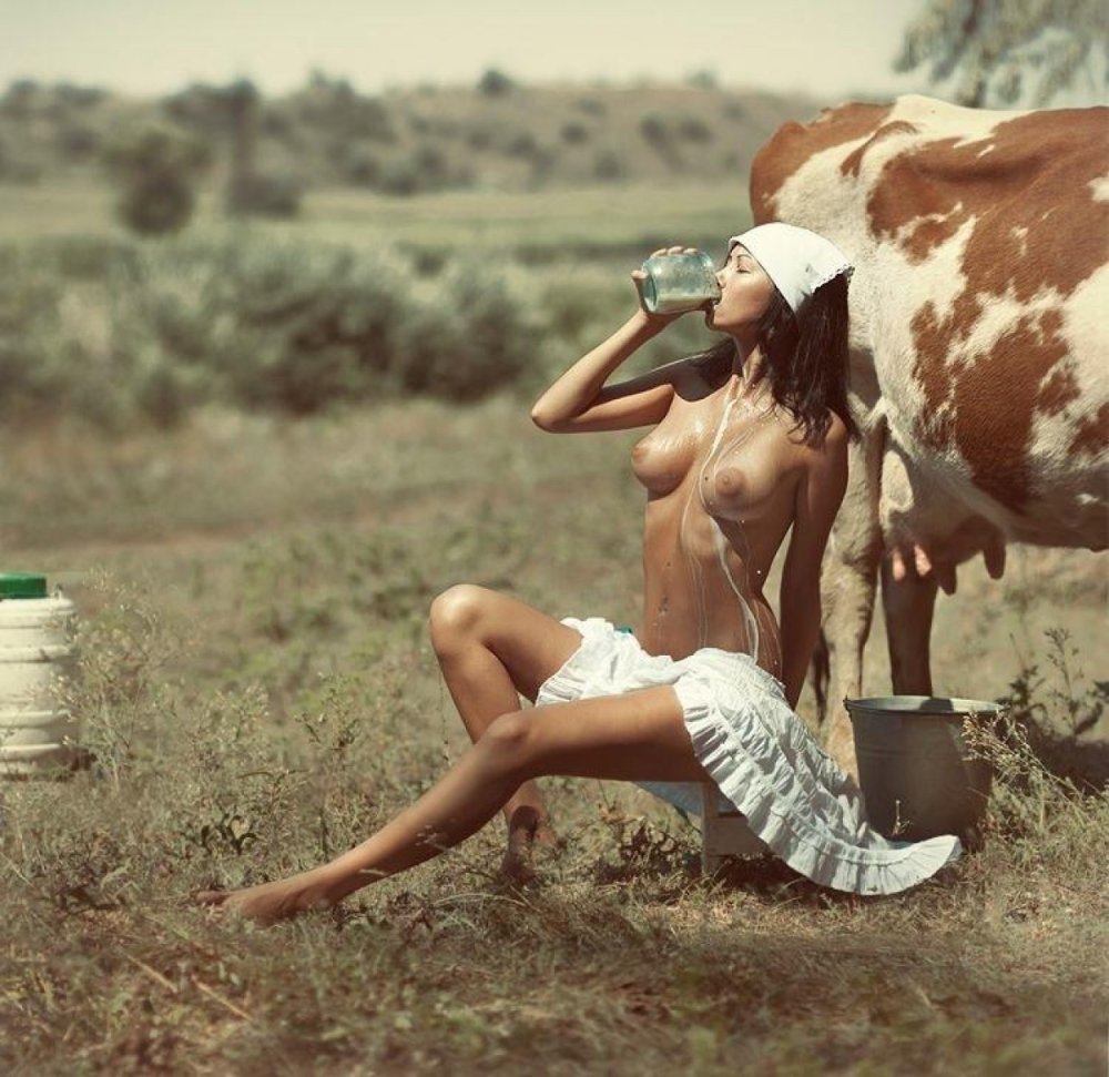 Photography of nude with cows