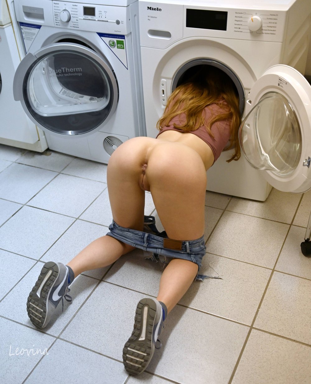 Naked on washing machine