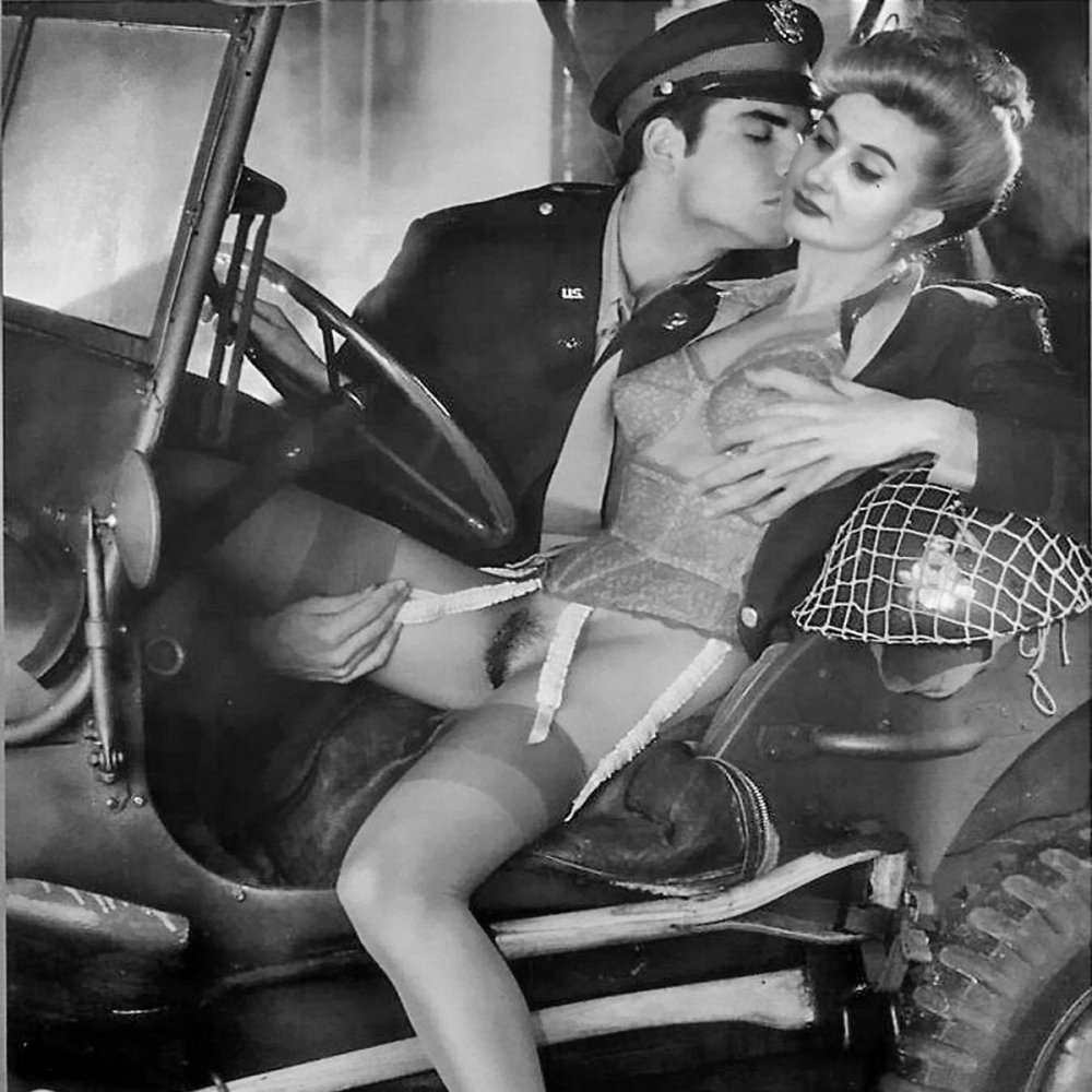 Naked women in military uniform retro