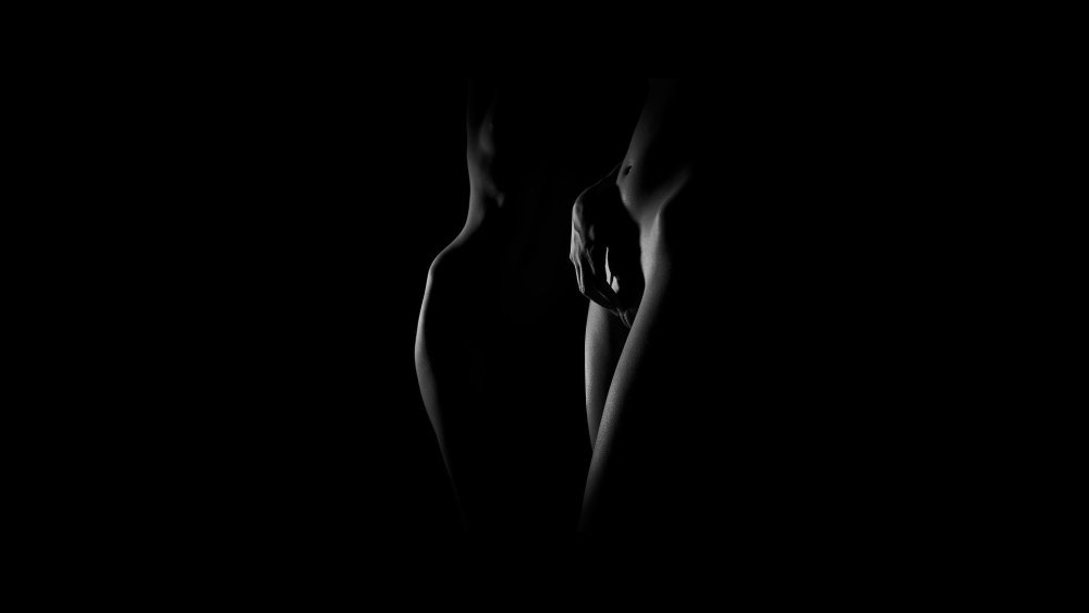 Erotic girls on a black background