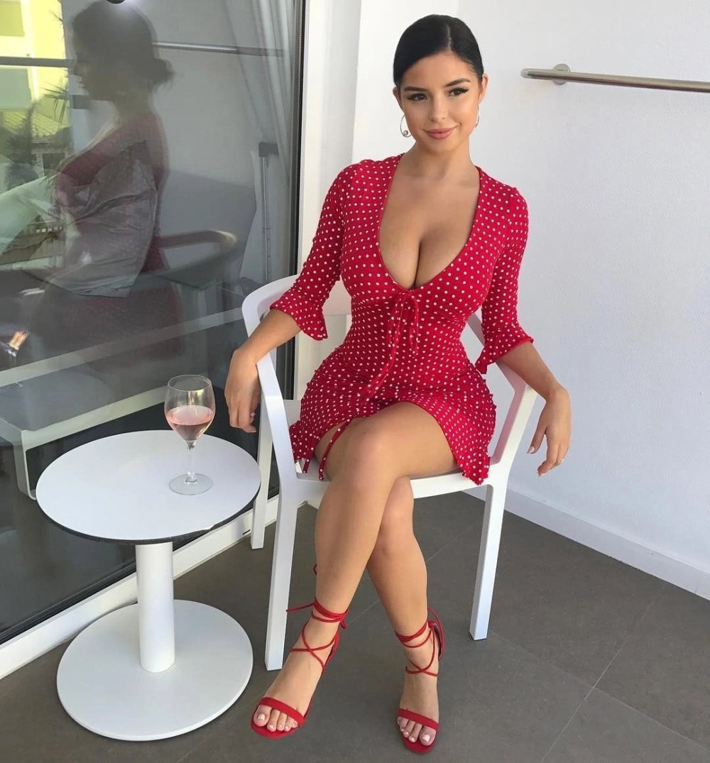 Demi Rose in a dress