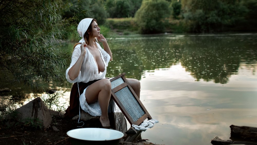 Washing on the river naked
