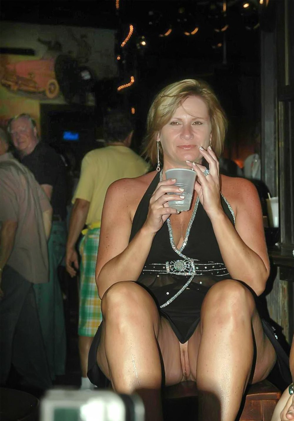 An adult woman lit up