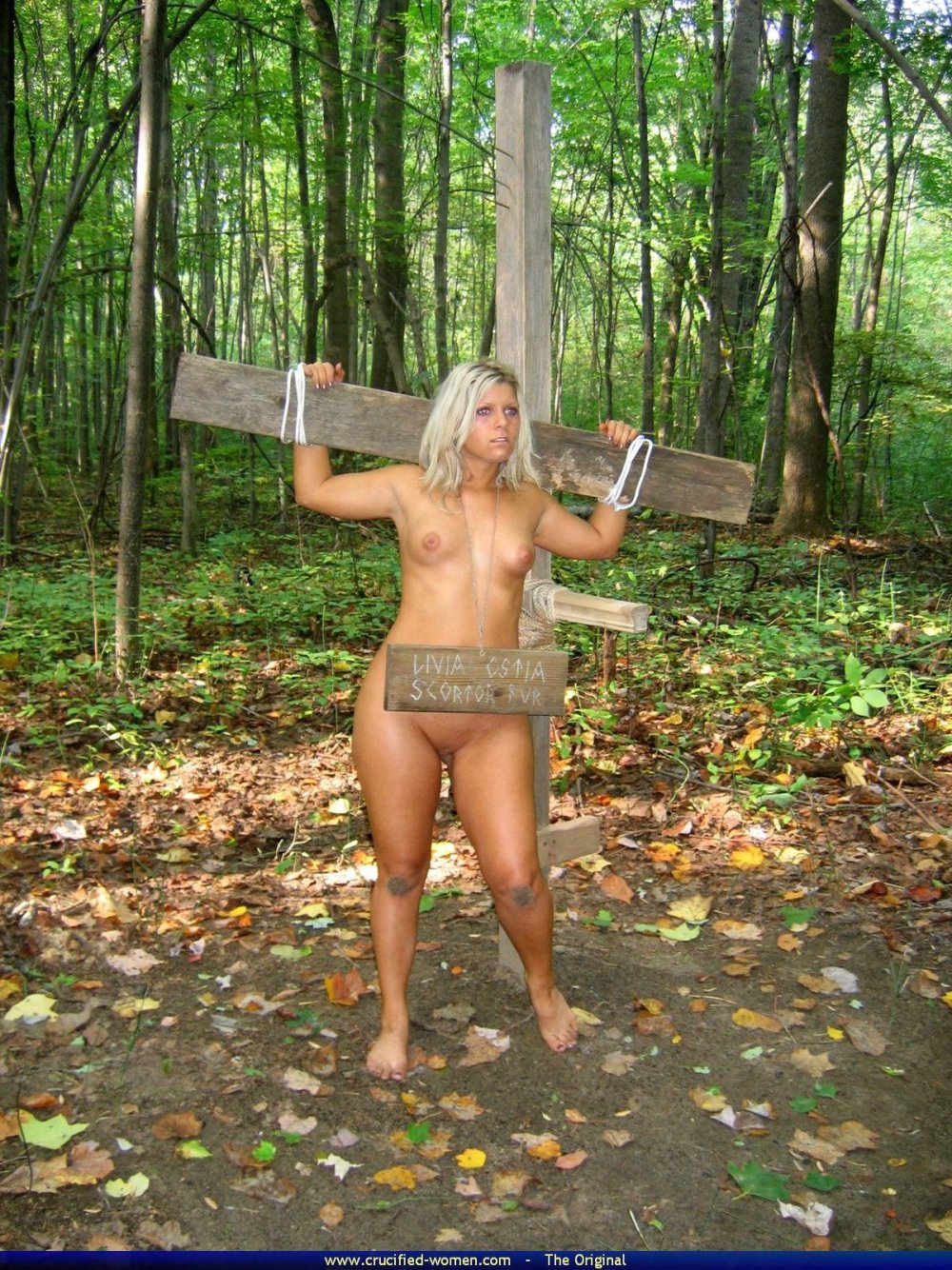 Naked slave in mud BDSM