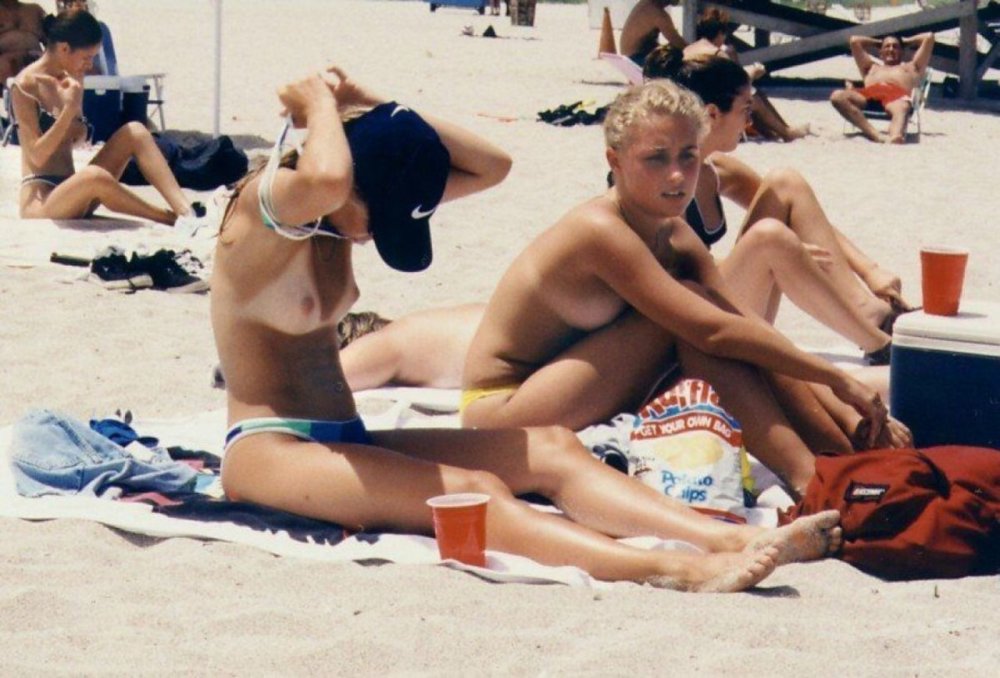 Topless on the beach with friends
