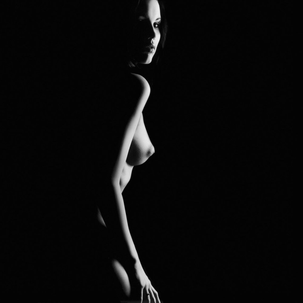 Naked women on a dark background