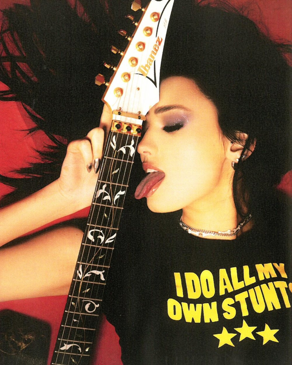 Girl with an electric guitar