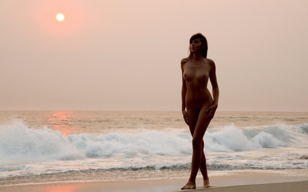 Naked women against the background of the sea