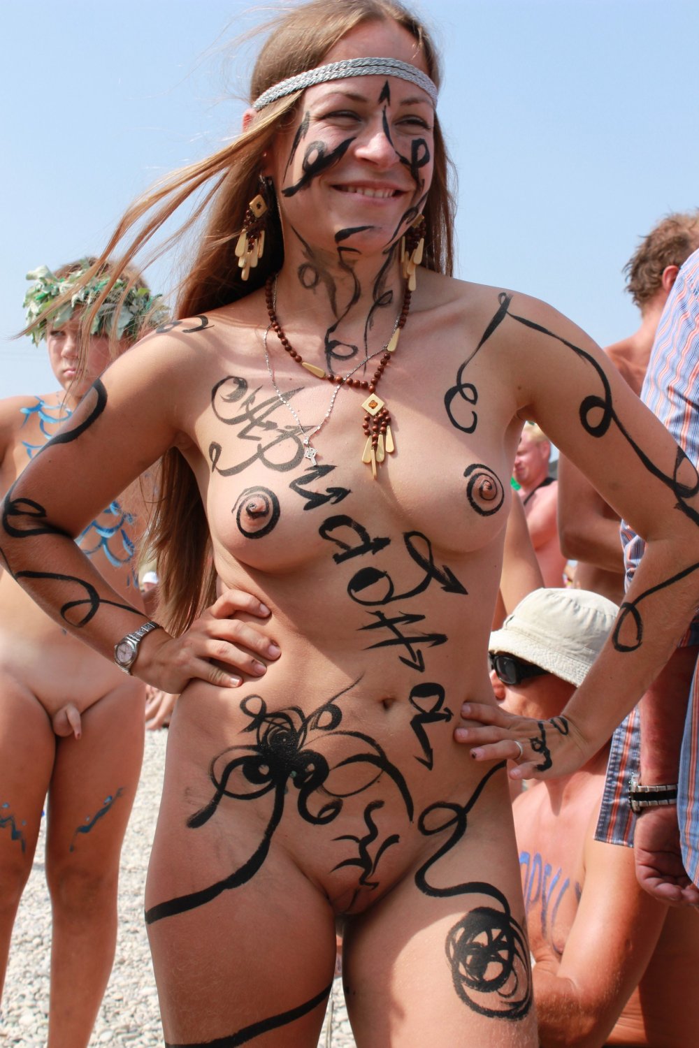 Women's naked priests on the beach