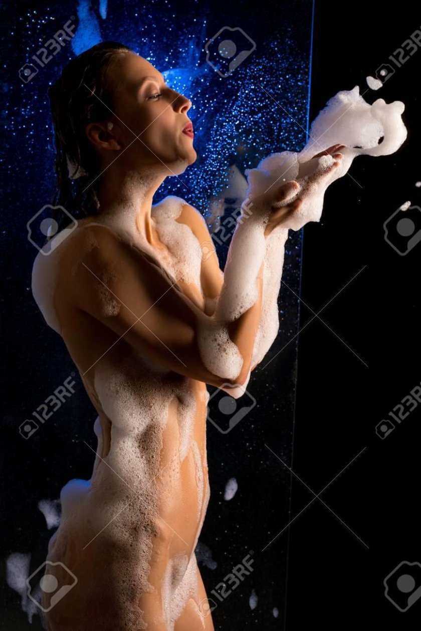 Dani Daniels washes in the shower