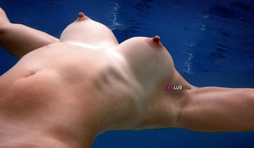 The girl bathes naked