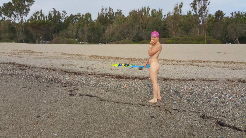 Naked wife on the beach