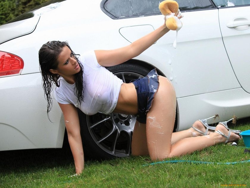 Naked women on a car wash