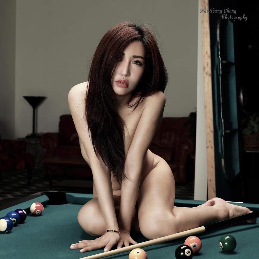 Girl on a billiard table