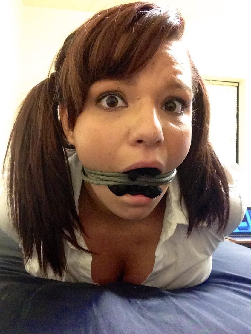 With a gag in the mouth