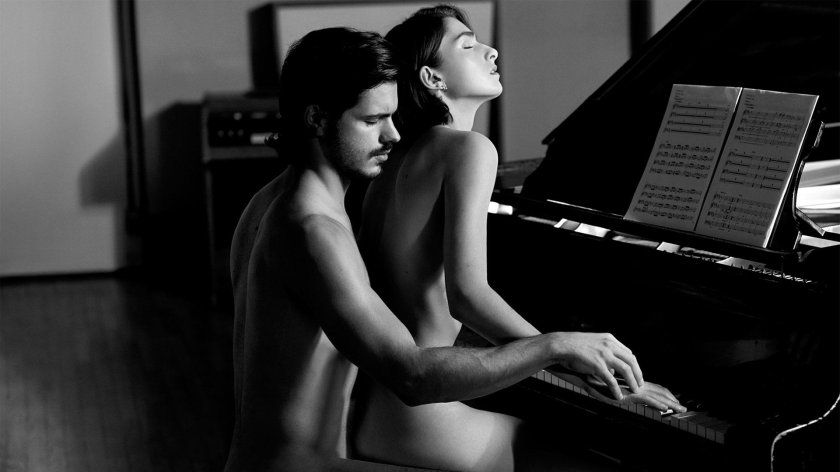 Naked woman for a piano