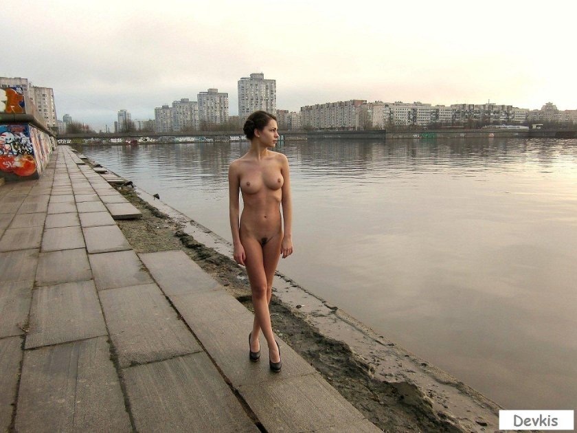 Photo shoot nude on the embankment