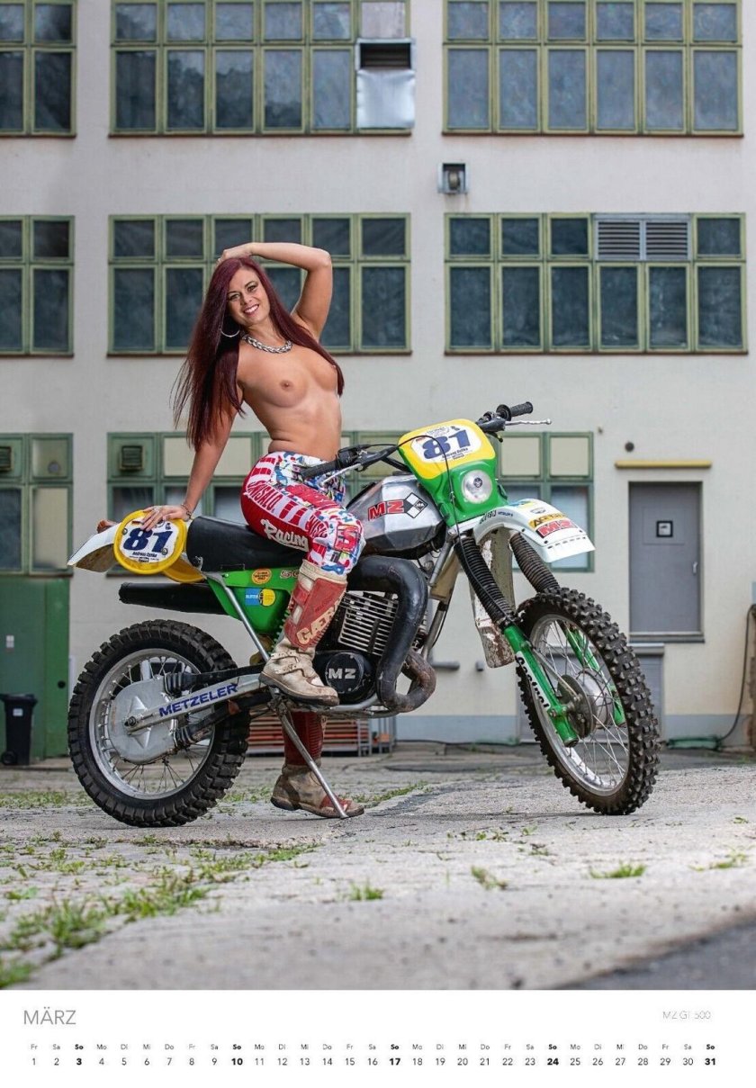 Naked girls on a motorcycle
