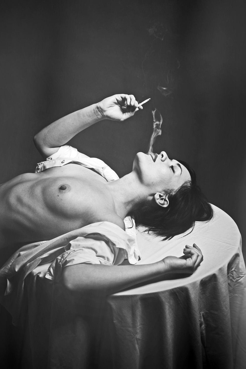 Erotic women with a cigarette