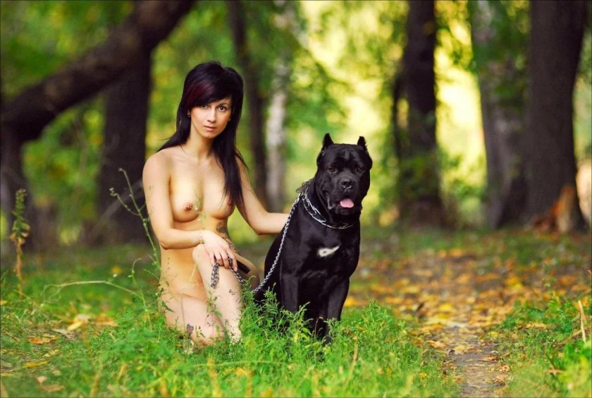 Photoshoot of nude with a dog in nature