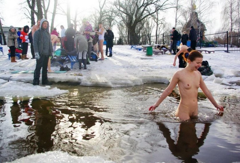 Bathing in an ice hole for baptism naked
