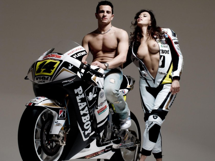 Erotic photo shoot with a motorcycle