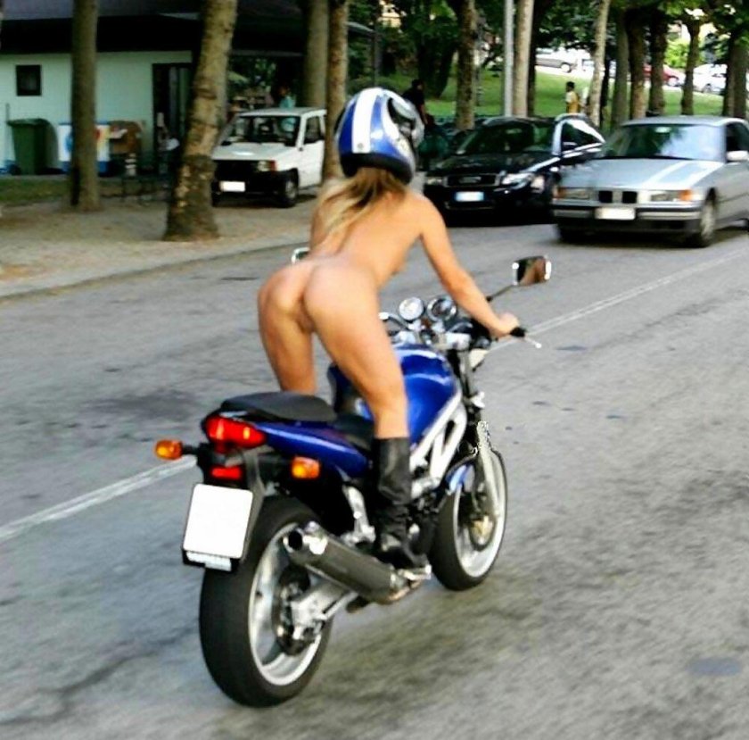 Girl on a motorcycle without panties