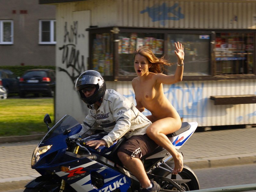 Naked woman on a motorcycle