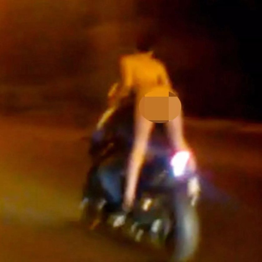 Naked girl on a motorcycle