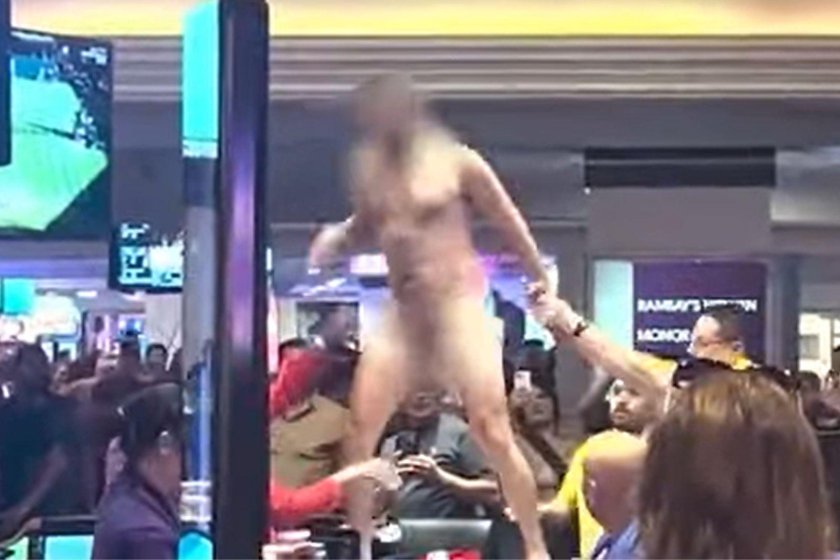 Naked guy in a shopping center