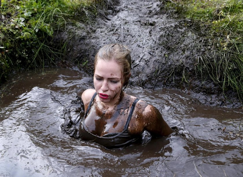 Bathes in mud