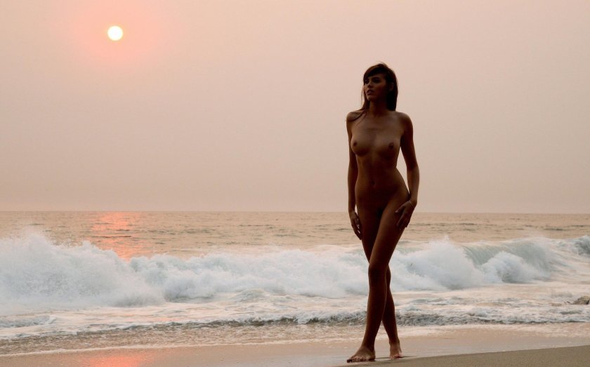 Naked women on the seashore
