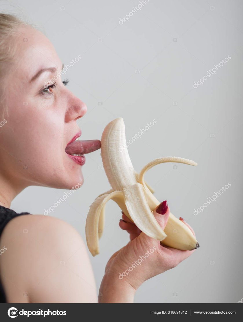 Girl sucks banana