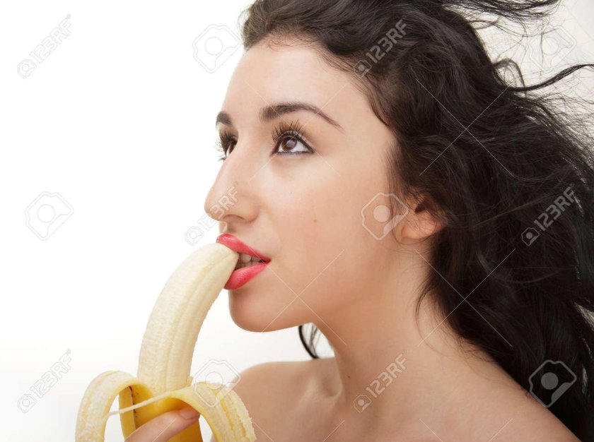 Banana in her mouth