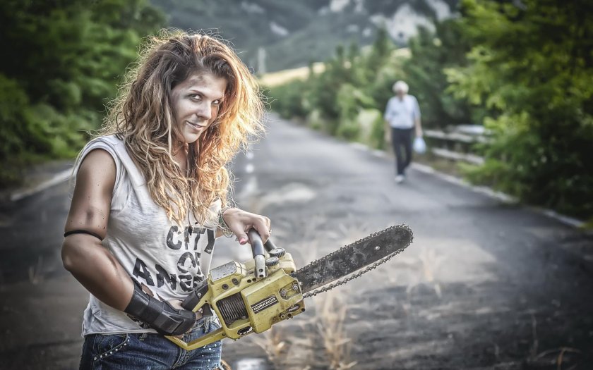 Girl with a chainsaw