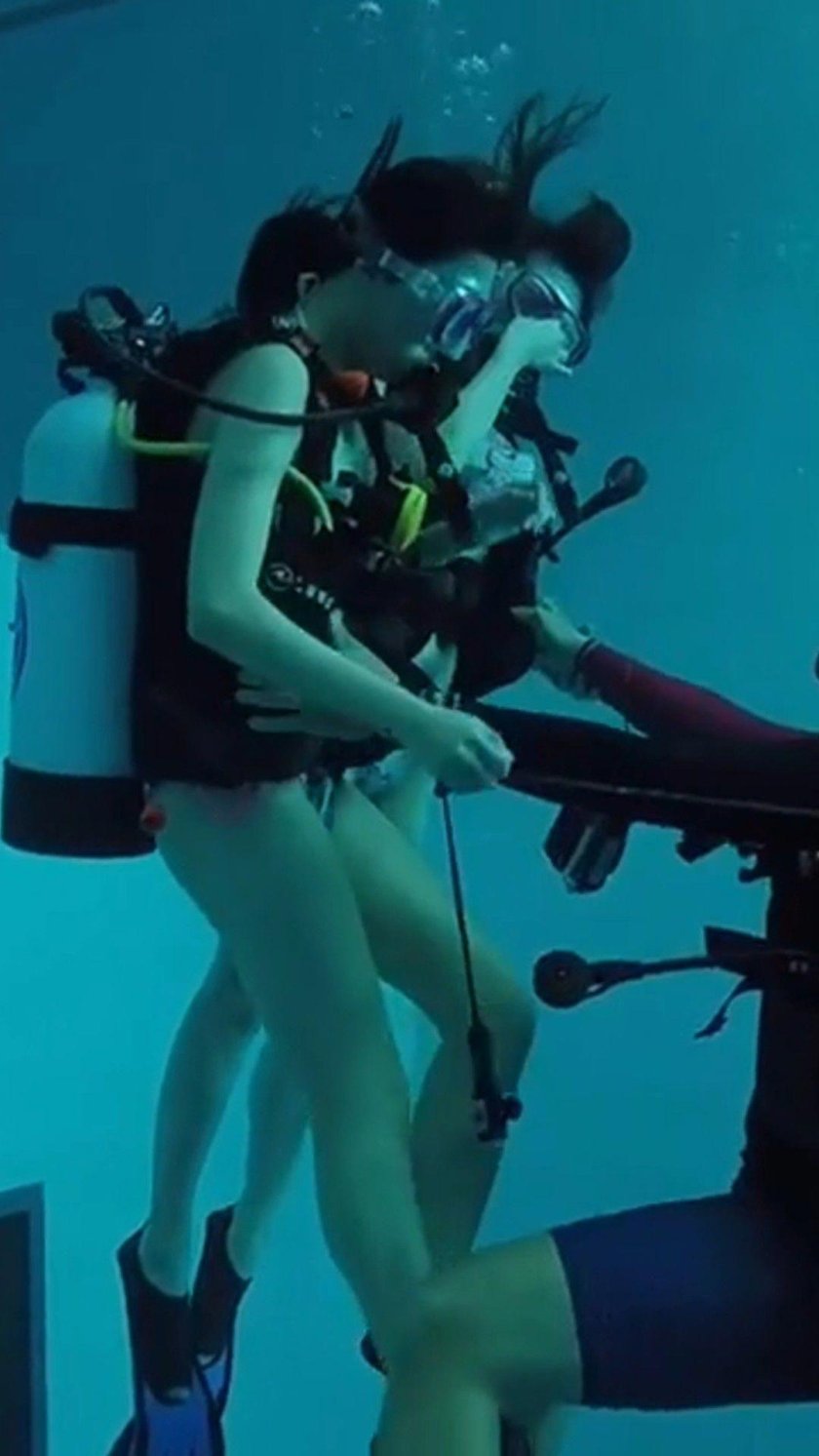 Submarine swimming with equipment